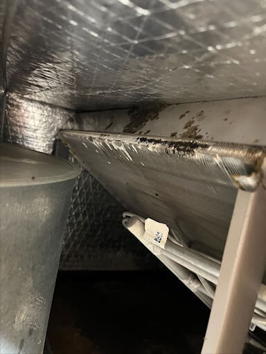 The interior of an air handler in Martinez. Call Bailey's for all your HVAC concerns.