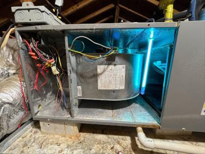 a man cleaning air ducts